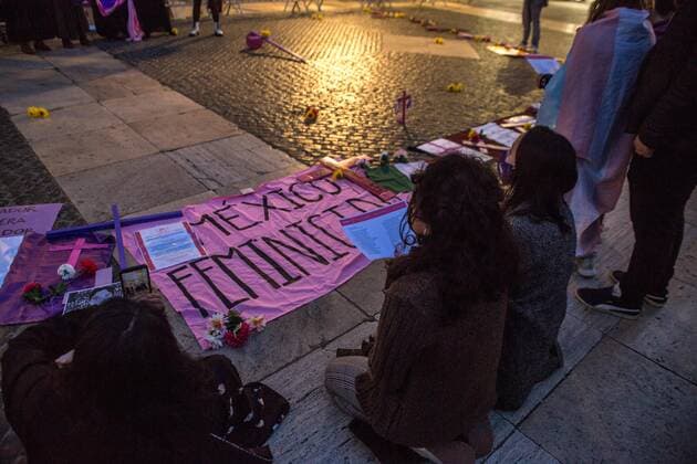 March 15, 2021, Barcelona, Spain: Women are seen singing in front of a placard that says, Mexico femicide during the demonstration..The collective of Mexican women in Barcelona, Mexican Fury (Furia Mexicana) have convened in front of the town hall as they protest against feminicide and sexist violence in Mexico and paid tribute to various victims of feminicide in Mexico in the last year. Barcelona Spain - ZUMAs197 20210315_zaa_s197_133 Copyright: xThiagoxPrudenciox