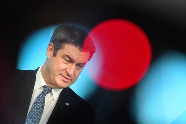 Markus SOEDER Ministerpraesident Bavaria and CSU chairman ,behind red light single picture,cropped single motive,portrait,portrait press conference of the Bavarian state government after cabinet meeting on 16 03 2021 in the Prinz Carl Palais in Munich