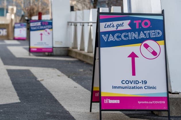 March 17, 2021, Toronto, Canada: A signage seen outside the Metro Convention Centre vaccination centre in Toronto..Toronto has launched Let s get TO Vaccinated program to eradicate COVID-19 pandemic. Toronto Canada - ZUMAs197 20210317_zaa_s197_188 Copyright: xShawnxGoldbergx