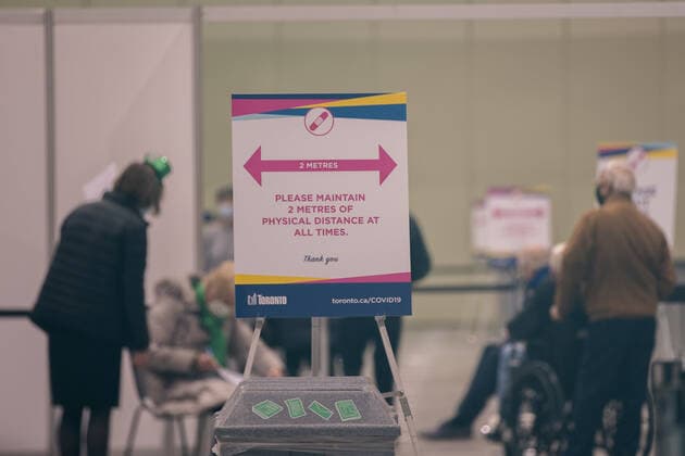 March 17, 2021, Toronto, Canada: People seen inside a Metro Convention Centre waiting to receive their first of two COVID-19 vaccine shots..Toronto has launched Let s get TO Vaccinated program to eradicate COVID-19 pandemic. Toronto Canada - ZUMAs197 20210317_zaa_s197_195 Copyright: xShawnxGoldbergx