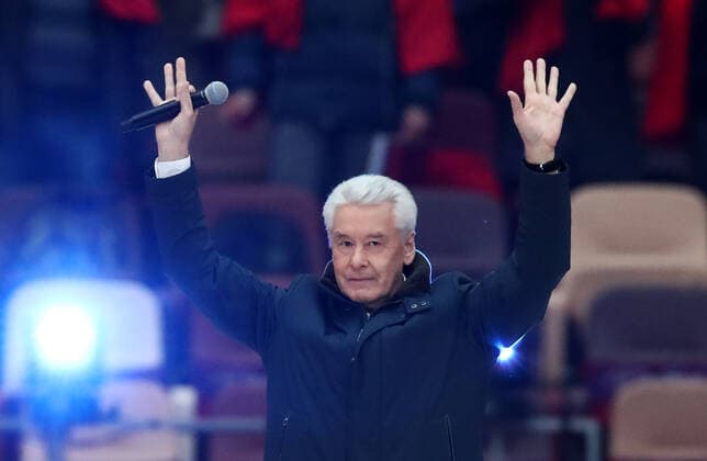 Moskau, Wladimir Putin bei Konzert zum 7. Jahrestag der Krim-Annexion MOSCOW, RUSSIA - MARCH 18, 2021: Moscow Mayor Sergei Sobyanin at a concert marking the 7th anniversary of the reunification of the Republic of Crimea and the city of Sevastopol with Russia, at Luzhniki Stadium. Stanislav Krasilnikov TASS  TS0F9C7A