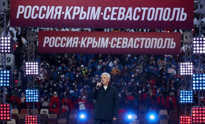 Moskau, Wladimir Putin bei Konzert zum 7. Jahrestag der Krim-Annexion MOSCOW, RUSSIA - MARCH 18, 2021: Moscow Mayor Sergei Sobyanin at a concert marking the 7th anniversary of the reunification of the Republic of Crimea and the city of Sevastopol with Russia, at Luzhniki Stadium. Vyacheslav Prokofyev TASS  TS0F9C80
