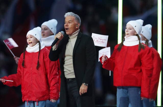 Moskau, Wladimir Putin bei Konzert zum 7. Jahrestag der Krim-Annexion MOSCOW, RUSSIA - MARCH 18, 2021: Singer Oleg Gazmanov performs at a concert marking the 7th anniversary of the reunification of the Republic of Crimea and the city of Sevastopol with Russia, at Luzhniki Stadium. Stanislav Krasilnikov TASS  TS0F9C8D
