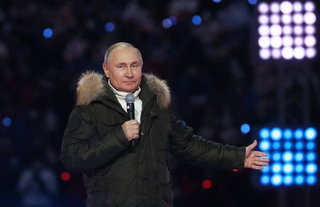 Moskau, Wladimir Putin bei Konzert zum 7. Jahrestag der Krim-Annexion MOSCOW, RUSSIA - MARCH 18, 2021: Russia s President Vladimir Putin speaks at a concert marking the 7th anniversary of the reunification of the Republic of Crimea and the city of Sevastopol with Russia, at Luzhniki Stadium. Stanislav Krasilnikov TASS  TS0F9C95