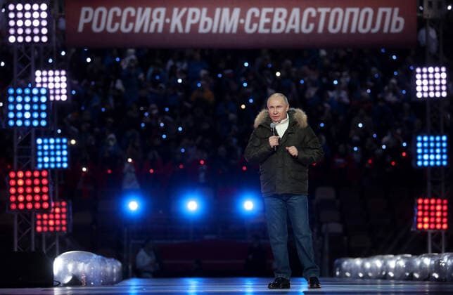 Moskau, Wladimir Putin bei Konzert zum 7. Jahrestag der Krim-Annexion MOSCOW, RUSSIA - MARCH 18, 2021: Russia s President Vladimir Putin speaks at a concert marking the 7th anniversary of the reunification of the Republic of Crimea and the city of Sevastopol with Russia, at Luzhniki Stadium. Stanislav Krasilnikov TASS  TS0F9CA4