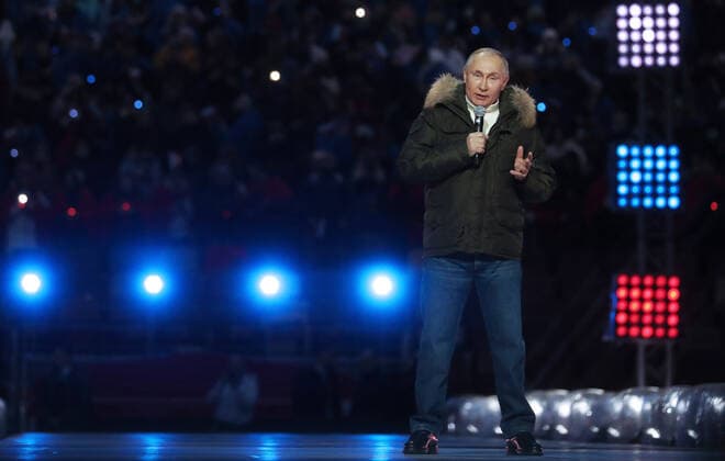 MOSCOW, RUSSIA - MARCH 18, 2021: Russia s President Vladimir Putin speaks at a concert marking the 7th anniversary of the reunification of the Republic of Crimea and the city of Sevastopol with Russia, at Luzhniki Stadium. Stanislav Krasilnikov TASS  TS0F9CA9