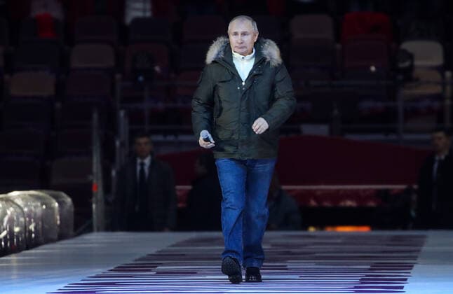 MOSCOW, RUSSIA - MARCH 18, 2021: Russia s President Vladimir Putin at a concert marking the 7th anniversary of the reunification of the Republic of Crimea and the city of Sevastopol with Russia, at Luzhniki Stadium. Vyacheslav Prokofyev TASS  TS0F9CBC