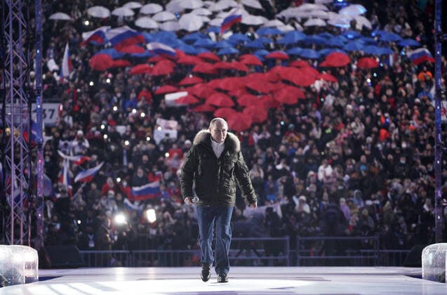 MOSCOW, RUSSIA - MARCH 18, 2021: Russia s President Vladimir Putin at a concert marking the 7th anniversary of the reunification of the Republic of Crimea and the city of Sevastopol with Russia, at Luzhniki Stadium. Alexei Druzhinin Russian Presidential Press and Information Office TASS  TS0F9CF8