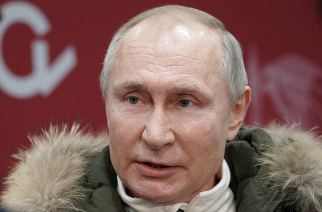 MOSCOW, RUSSIA - MARCH 18, 2021: Russia s President Vladimir Putin before walking out to the stage at a concert marking the 7th anniversary of the reunification of the Republic of Crimea and the city of Sevastopol with Russia, at Luzhniki Stadium. Alexei Druzhinin Russian Presidential Press and Information Office TASS  TS0F9CF9
