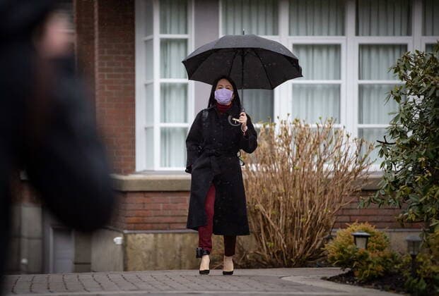 March 19, 2021, Vancouver, BC, Canada: Meng Wanzhou, chief financial officer of Huawei, leaves her home to attend a hearing at B.C. Supreme Court, in Vancouver, B.C., Friday, March 19, 2021. Vancouver Canada  - ZUMAc35_ 20210319_zaf_c35_027 Copyright: xDarrylxDyckx