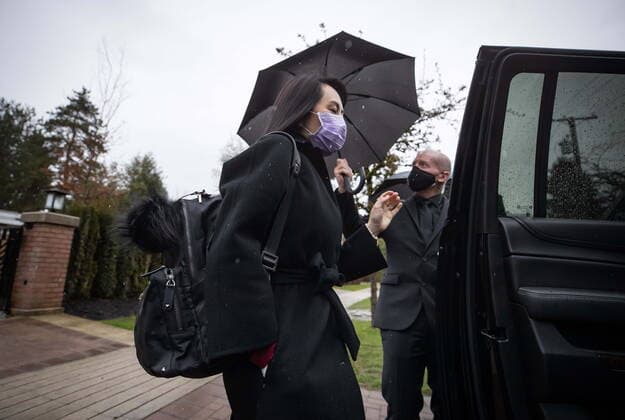 March 19, 2021, Vancouver, BC, Canada: Meng Wanzhou, chief financial officer of Huawei, leaves her home to attend a hearing at B.C. Supreme Court, in Vancouver, B.C., Friday, March 19, 2021. Vancouver Canada  - ZUMAc35_ 20210319_zaf_c35_032 Copyright: xDarrylxDyckx