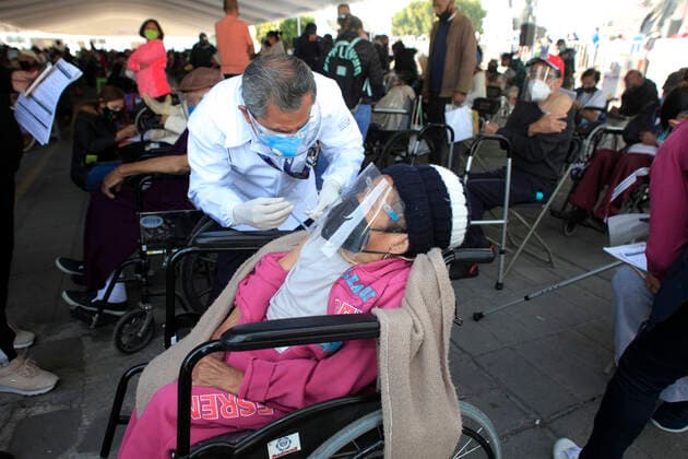 Begins Apply Of Dose Of Sputnik V In Mexico NEZAHUALCOYOTL, MEXICO - MARCH 19: A elderly receives a Sputnik V dose, during the mass vaccination of the national vaccination program for adults over 60 years old against Covid-19 disease, inside Nezahualcoyotl Sports Unit located at municipality of Nezahualcoyotl, state of Mexico. On March 19, 2021 in Nezahualcoyotl City, Mexico. Copyright: xAngelxMoralesxRizox EYEPIXGROUP_AM_19032021_5030