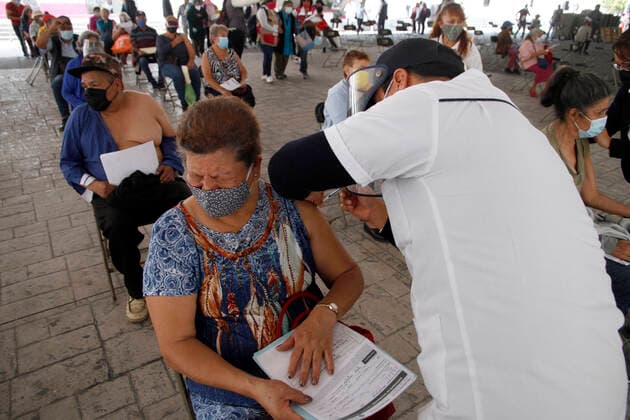 Nezahualcoyotl City Council Applies Sinovac Vaccine For Older Adults NEZAHUALCOYOTL, MEXICO - MARCH 19: A elderly receives an dose of the Sinovac Covid19 vaccine during a mass vaccination for dults over 60 years of age at the Nezahualcoyotl City Hall in the State of Mexico. on March 19, 2021 in Nezahualcoyotl, Mexico. Copyright: xLuisxBarronx EYEPIXGROUP_LB_19032021_5089