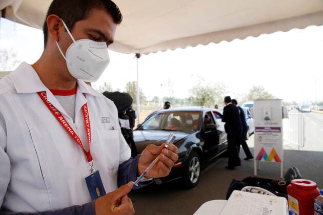 Sinovac Vaccine Is Applied To Older Adults In Their Cars In Mexico NEZAHUALCOYOTL CITY, MEXICO - MARCH 19: A health worker prepares Sinovac Covid19 vaccine, before inject to a elderly at the Sports City Garden, in the municipality of Nezahualcoyotl in the State of Mexico, during a immunization program to drivers against Covid19. On March 19, 2021 in Nezahualcoyotl City, Mexico. Copyright: xLuisxBarronx EYEPIXGROUP_LB_19032021_5102