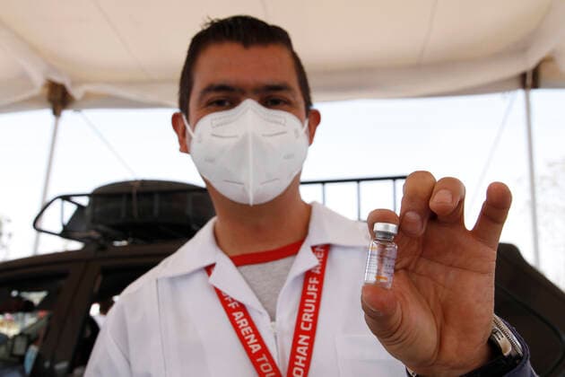 Sinovac Vaccine Is Applied To Older Adults In Their Cars In Mexico NEZAHUALCOYOTL CITY, MEXICO - MARCH 19: A health worker shows a Sinovac Covid19 dose, after inject it to a elderly at the Sports City Garden, in the municipality of Nezahualcoyotl in the State of Mexico, during a immunization program to drivers against Covid19. On March 19, 2021 in Nezahualcoyotl City, Mexico. Copyright: xLuisxBarronx EYEPIXGROUP_LB_19032021_5105