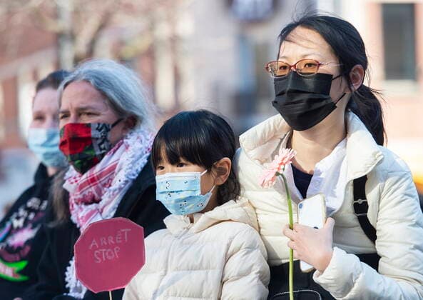March 21, 2021, Montreal, PQ, Canada: People attend a vigil in Montreal, Sunday, March, 21, 2021, to highlight Asian racism and to remember the victims who were murdered in Atlanta. Montreal Canada  - ZUMAc35_ 20210321_zaf_c35_058 Copyright: xGrahamxHughesx