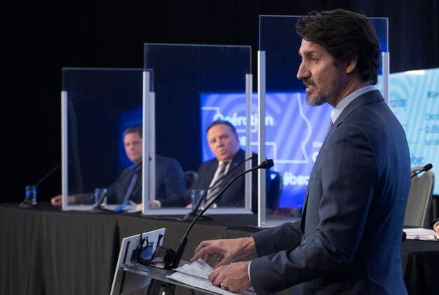 March 22, 2021, TROIS-RIVIERES, PQ, Canada: Prime Minister Justin Trudeau jointly announces high speed internet for Quebec regions, as Quebec Premier Francois Legault, left, looks on, Monday, March 22, 2021 in Trois-Rivieres Que. TROIS-RIVIERES Canada - ZUMAc35_ 20210322_zaf_c35_041 Copyright: xJacquesxBoissinotx