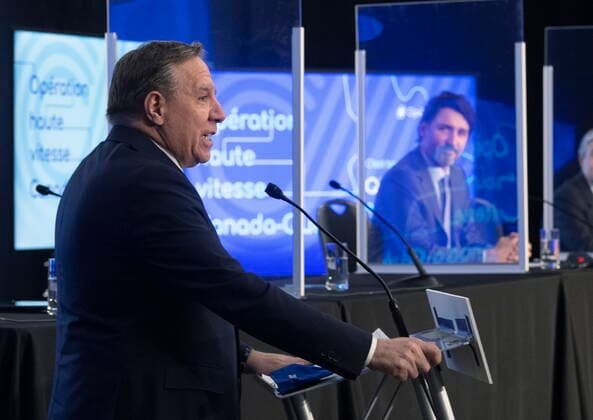 March 22, 2021, TROIS-RIVIERES, PQ, Canada: Quebec Premier Francois Legault jointly announces high speed internet for Quebec regions, as Prime Minister Justin Trudeau, right, looks on, Monday, March 22, 2021 in Trois-Rivieres Que. TROIS-RIVIERES Canada - ZUMAc35_ 20210322_zaf_c35_042 Copyright: xJacquesxBoissinotx