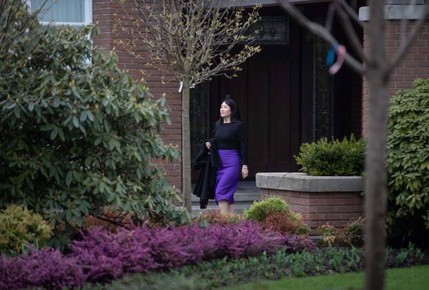 March 23, 2021, Vancouver, BC, Canada: Meng Wanzhou, chief financial officer of Huawei, leaves her home to attend a hearing at B.C. Supreme Court in Vancouver on Tuesday, March 23, 2021. Vancouver Canada  - ZUMAc35_ 20210323_zaf_c35_022 Copyright: xDarrylxDyckx