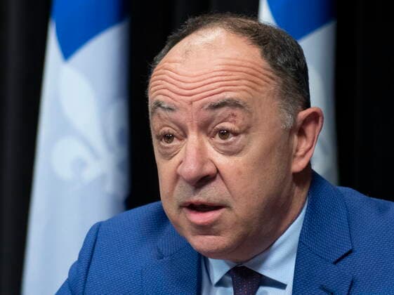 March 23, 2021, QUEBEC, PQ, Canada: Quebec Health Minister Christian Dube, right, responds to reporters questions during a news conference on the COVID-19 pandemic, Tuesday, March 23, 2021 at the legislature in Quebec City. QUEBEC Canada  - ZUMAc35_ 20210323_zaf_c35_027 Copyright: xJacquesxBoissinotx