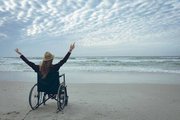 Caucasian woman disable sitting with open arm on wheelchair at beach Rear view of young Caucasian woman disable sitting with open arm on wheelchair at beach. She wears hat Cork, Ireland, 05.02.2019, 1239095.jpg, beautiful, pretty, blonde, gen z, generation z, casual clothing, sitting, looking, open arm, arm stretched, relaxing, wheelchair, disabled, handicapped, physical impairment, sea, ocean, beach, sky, cloud, cloudy, shore, wave, horizon, rock, nature, environment, tranquility, serenity, calm, peaceful, scenic, travel, travel destination, tourism, holiday, vacation Outdoors,Rear view,Day