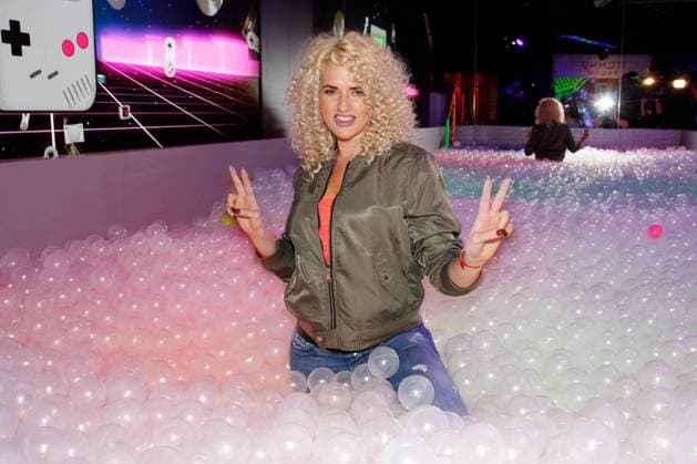 Sarah Knappik in the ball pool at the big 90s neon bash at Madame Tussauds Berlin Madame Tussauds goes pop up under the motto Let s Glow a brand new area at the popular attraction Unter den Linden will be inaugurated on 27 March 2018 40 000 neon balls, a glowing dance floor, a lounge bar and four 90s stars will bring the cult decade to life for three mon Copyright: xEventpressxGolejewskix