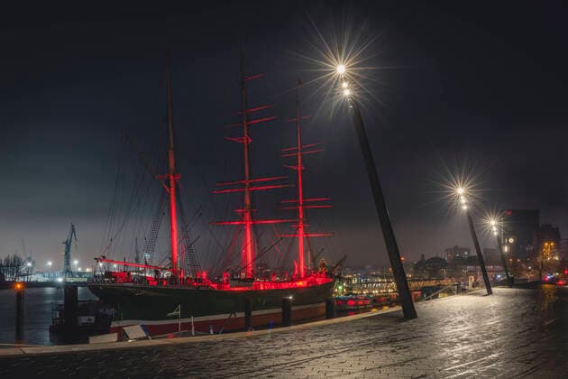 Germany, Hamburg, Museum ship illuminated at night KEBF01800