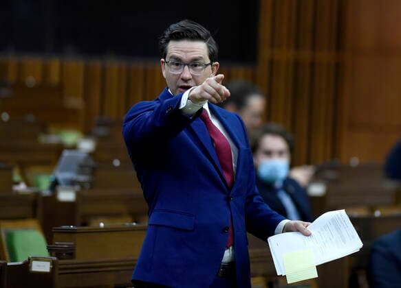March 25, 2021, Ottawa, on, Canada: Conservative MP Pierre Poilievre rises during Question Period in the House of Commons on Parliament Hill in Ottawa on Thursday, March 25, 2021. Ottawa Canada  - ZUMAc35_ 20210325_zaf_c35_053 Copyright: xJustinxTangx