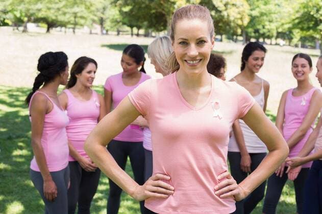 IMAGO Creative: Brustkrebsmonat Female volunteer supporting breast cancer campaign Portrait of happy female volunteer supporting breast cancer campaign at park, model released, , property released, Cape Town, South Africa, 12.11.2013, 283731.jpg, lifestyle, beautiful, attractive, park, parkland, breast cancer, pink, ribbon, symbol, charity, awareness, womens health, casuals, multiethnic group, alertness, supporting, friendship, friends, together, bonding, charity and relief work, volunteer, concern, care, participate, volunteering, participation, participating, welfare, social, confidence, group, standing, smiling, happy, communicating, discussing, talking, listening, campaign, hand on hip 20s, Young Adult, Woman, Female, Mixed-Race, Hispanic, 50s, Mature Adult, Caucasia