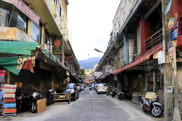 PHUKET, THAILAND â€“ MARCH 21, 2021: A deserted street in Patong on Phuket during the COVID-19 pandemic. On 26 March 2020, Thailandâ€™s prime minister Chan-o-cha introduced entry restrictions for foreign nationals, which suspended most commercial flights to the country, due to the COVID-19 pandemic. With the restrictions in place for a year, Thailandâ€™s tourism revenues have dropped from 63.1 bn to 10.96 bn US dollars. Thailandâ€™s government has decided to exempt tourists arriving to Phuket from travel quarantine as long as they have been vaccinated against COVID-19, starting from 1 July 2021. Grigory Zimenkov TASS  TS0FA8C9