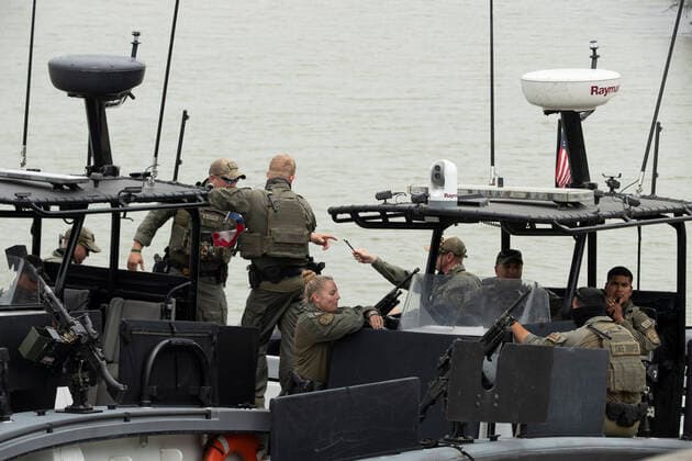 March 26, 2021, Granejo, Texas, USA: Texas Dept. of Public Safety troopers prepare to lead a delegation of eighteen U.S. Senators to tour the Rio Grande River south of Mission in four Texas Dept. of Public Safety gunboats at the end of a whirlwind tour of south Texas. The senators saw an overcrowded migrant processing center in Donna and a corpse floating in the river north of Anzalduas Park. Granejo USA - ZUMAd150 20210326_znp_d150_001 Copyright: xBobxDaemmrichx