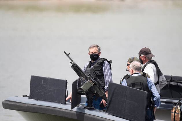 March 26, 2021, Granejo, Texas, USA: Sen STEVE DAINES, R-Montana, looks on as a delegation of eighteen U.S. Senators tour the Rio Grande River south of Mission in four Texas Dept. of Public Safety gunboats at the end of a whirlwind tour of south Texas. The senators saw an overcrowded migrant processing center in Donna and a corpse floating in the river north of Anzalduas Park. Granejo USA - ZUMAd150 20210326_znp_d150_015 Copyright: xBobxDaemmrichx