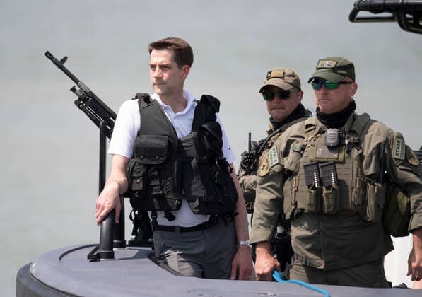 March 26, 2021, Granejo, Texas, USA: Sen. TOM COTTON, R-Arkansas, observes as a delegation of eighteen U.S. Senators tour the Rio Grande River south of Mission in four Texas Dept. of Public Safety gunboats at the end of a whirlwind tour of south Texas. The senators saw an overcrowded migrant processing center in Donna and a corpse floating in the river north of Anzalduas Park. Granejo USA - ZUMAd150 20210326_znp_d150_028 Copyright: xBobxDaemmrichx