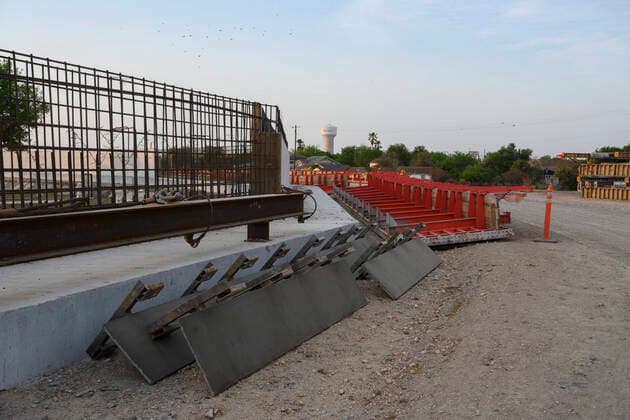 March 26, 2021, Granejo, Texas, USA: Machinery and construction material including rebar sit idle and untouched yards from the Rio Grande River south of Mission where a section of the U.S.-Mexico border wall sits incomplete. This section would isolate the Chimney s RV Park and historical La Lomita Chapel on the Mexican side of the wall. Granejo USA - ZUMAd150 20210326_znp_d150_054 Copyright: xBobxDaemmrichx
