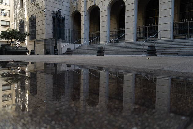 March 27, 2021, Santiago, Metropolitana, Chile: An empty street is reflected in a pool of water, on the first day of total quarantine in Santiago de Chile. Santiago Chile - ZUMAb332 20210327_zip_b332_006 Copyright: xMatiasxBasualdox