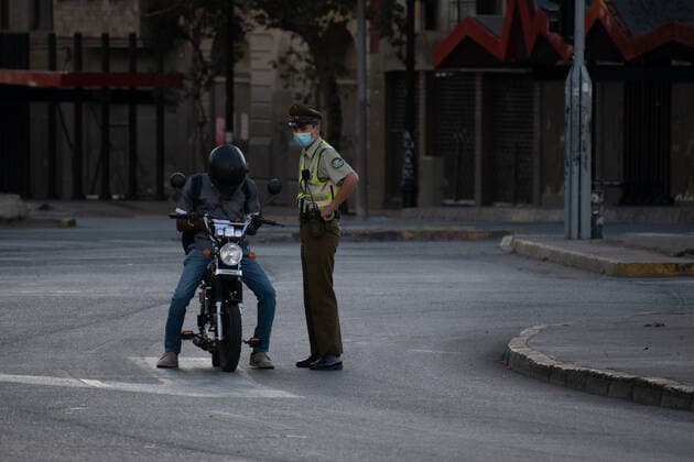 March 27, 2021, Santiago, Metropolitana, Chile: Police inspect motorists on the first day of total quarantine in Santiago, Chile. Santiago Chile - ZUMAb332 20210327_zip_b332_023 Copyright: xMatiasxBasualdox