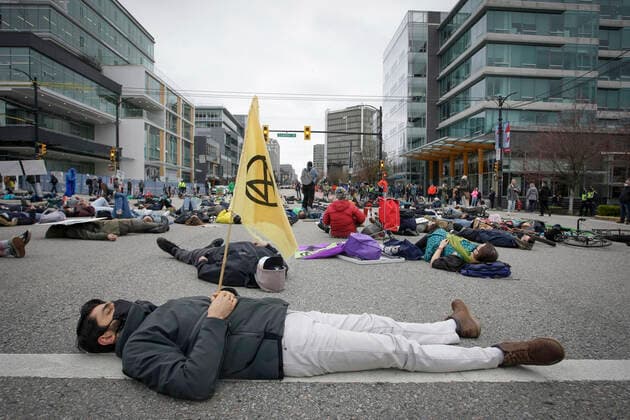 (210327) -- VANCOUVER, March 27, 2021 -- People take part in a climate change protest in Vancouver, British Columbia, Canada, on March 27, 2021. (Photo by Xinhua) CANADA-VANCOUVER-CLIMATE CHANGE-PROTEST LiangxSen 