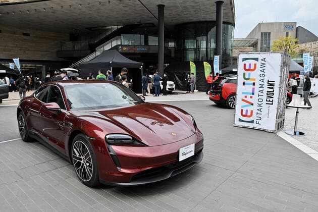 Porsche Taycan is display at an event in Tokyo, Japan on Sunday, March 28, 2021. Electric vehicles of 12 companies displayed in this event.  TKP20210328109 KEIZOxMORI