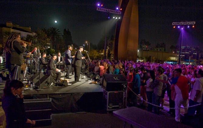 March 28, 2021, Costa Mesa, California, USA: Boogaloo Assassins perform in the plaza at the Segerstrom Center for the Arts. The Boogaloo Assassins is a12 piece Boogaloo, Salsa and Latin Soul group from Los Angeles, California. Costa Mesa USA - ZUMAk145 20210328_zap_k145_109 Copyright: xNicholasxKoonx