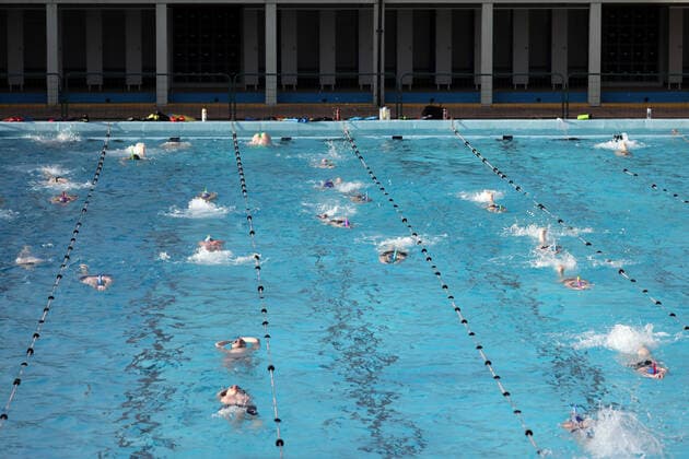 Swimmers enjoying the first dip in the Peterborough Lido for over a year, as it has been unable to open since the first lockdown in March 2020. Peterborough Lido was first opened in 1936 and still retains the art deco look to this day. Today lockdown restrictions are starting to ease and outdoor sports like swimming and tennis, with people also being allowed to take part in organised outdoor sports, and outdoor gatherings of up to six people or a larger group from up to two households will be permissible. 