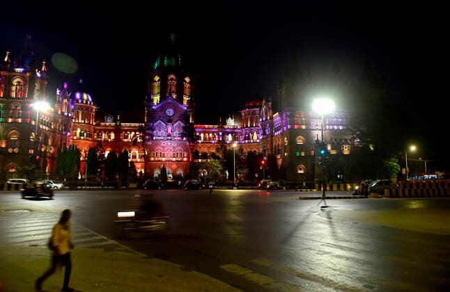 MUMBAI, INDIA - MARCH 28: Chhatrapati Shivaji Maharaj Terminus (CSMT) near empty after a night curfew between 8:00 pm to 7:00 am came into effect, on March 28, 2021 in Mumbai, India. (Photo by Anshuman Poyrekar Hindustan Times) Covid 19 Night Curfew In Mumbai Tourists Spot Wear Deserted Look
