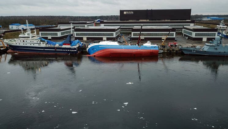 OTRADNOYE, LENINGRAD REGION, RUSSIA - MARCH 30, 2021: The heeled over Skorpion trawler (C) is pictured at the Pella Shipyard. The vessel that is under construction, heeled over and the holds were flooded on March 30. Six workers were able to evacuate; a rescue operation for two people is underway. Peter Kovalev TASS  TS0FB01F