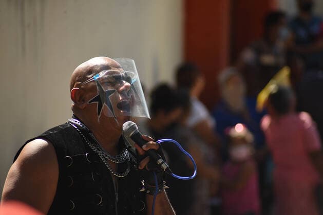 March 30, 2021, Tuzamapan, Veracruz, Mo xico: The musical group Los super Caracoles plays their songs while older adults wait in line to be vaccinated against Covid-19. Some older adults joined the dance and celebration to receive the vaccine Tuzamapan MÃ xico - ZUMAqp1_ 20210330_zip_qp1_010 Copyright: xHectorxAdolfoxQuintanarxPerezx