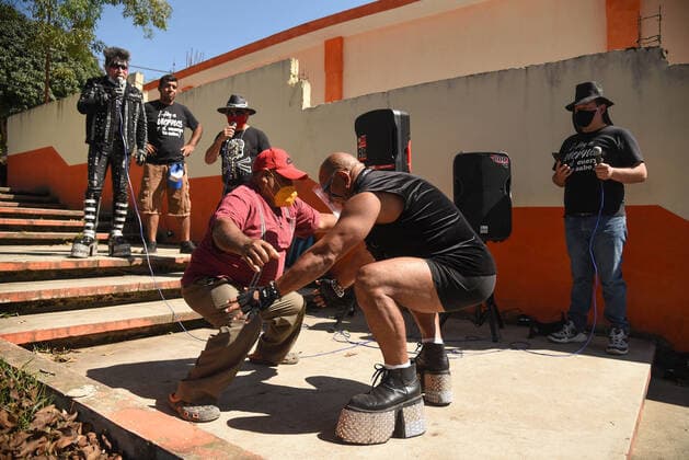 March 30, 2021, Tuzamapan, Veracruz, Mo xico: The musical group Los super Caracoles plays their songs while older adults wait in line to be vaccinated against Covid-19. Some older adults joined the dance and celebration to receive the vaccine Tuzamapan MÃ xico - ZUMAqp1_ 20210330_zip_qp1_014 Copyright: xHectorxAdolfoxQuintanarxPerezx