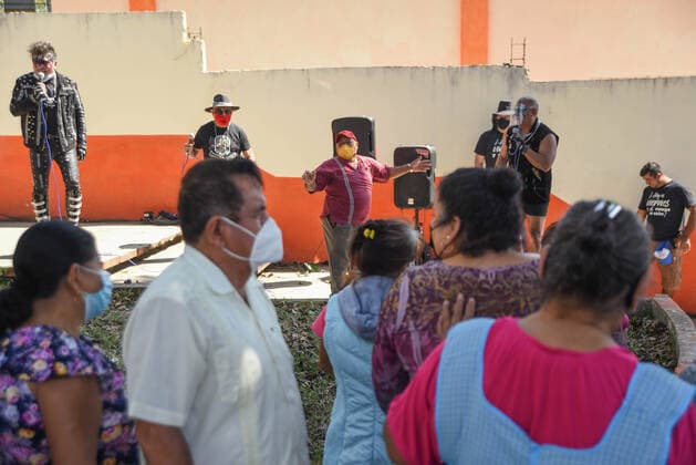 March 30, 2021, Tuzamapan, Veracruz, Mo xico: The musical group Los super Caracoles plays their songs while older adults wait in line to be vaccinated against Covid-19. Some older adults joined the dance and celebration to receive the vaccine Tuzamapan MÃ xico - ZUMAqp1_ 20210330_zip_qp1_019 Copyright: xHectorxAdolfoxQuintanarxPerezx