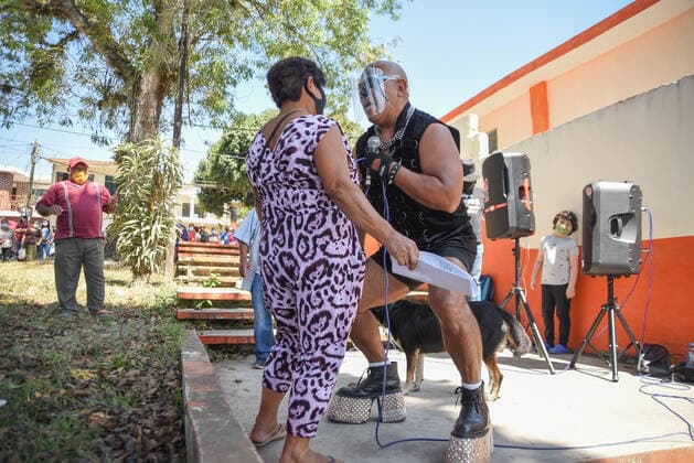 March 30, 2021, Tuzamapan, Veracruz, Mo xico: The musical group Los super Caracoles plays their songs while older adults wait in line to be vaccinated against Covid-19. Some older adults joined the dance and celebration to receive the vaccine Tuzamapan MÃ xico - ZUMAqp1_ 20210330_zip_qp1_021 Copyright: xHectorxAdolfoxQuintanarxPerezx
