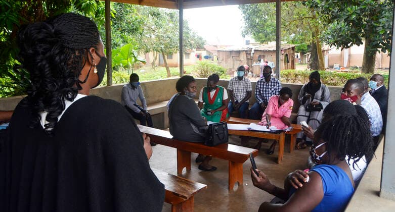 (210331) -- KAMPALA, March 31, 2021 -- Teachers attend COVID-19 vaccination campaign at a health center in Kampala, capital of Uganda, March 31, 2021. Uganda launched the first phase of COVID-19 vaccination campaign on March 10, targeting high risk groups in the east African country. The ministry of health targets to vaccinate more than 21.9 million people who face the highest risk of the infection, which include health workers, teachers, security personnel, elderly and those with underlying medical conditions. (Photo by Xinhua) UGANDA-KAMPALA-TEACHERS-VACCINATION NicholasxKajoba