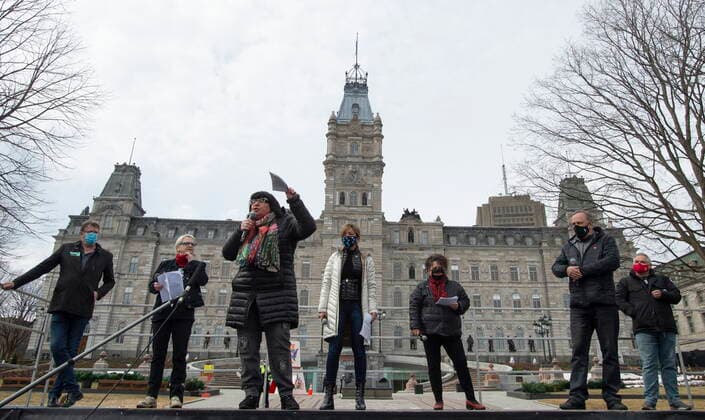 March 31, 2021, QUEBEC, PQ, Canada: CSQ president Sonia Ethier speaks to union workers of the public sector as they demonstrate to get better offers from the government, Wednesday, March 31, 2021 at the legislature in Quebec City. Eight union leaders gathered with hundreds of demonstrators. QUEBEC Canada  - ZUMAc35_ 20210331_zaf_c35_022 Copyright: xJacquesxBoissinotx