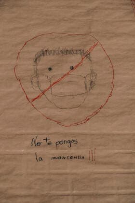 March 31, 2021, Barcelona, Catalonia, Spain: A kid s drawing against the wearing of face masks during the demonstration..Summoned by the platform against the obligation of sanitary masks in minors, El Tercer Grupo, some fifty people have gathered at the doors of the Sant Joan De Deu Children s Hospital to protest the call of the hospital to carry out tests of the covid 19 vaccine on minors. Barcelona Spain - ZUMAs197 20210331_zaa_s197_063 Copyright: xPacoxFreirex