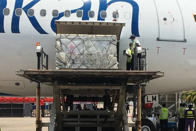 (210401) -- COLOMBO, April 1, 2021 () -- Cellphone photo shows workers unloading Sinopharm COVID-19 vaccines at the Bandaranaike International Airport in Colombo, Sri Lanka, March 31, 2021. A batch of Sinopharm vaccines arrived in Sri Lanka from China on Wednesday as part of a donation by the Chinese government to the island nation. () SRI LANKA-COLOMBO-CHINA-COVID-19-VACCINES-ARRIVAL Xinhua 